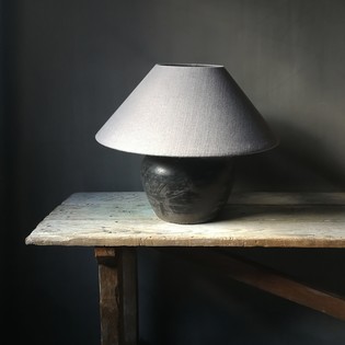 Black and grey ceramic table lamp with grey linnen shade