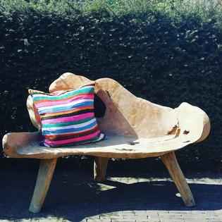 A teak garden bench