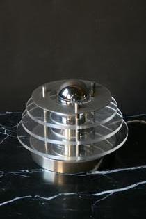 A vintage aluminium and plexi table lamp