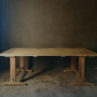 An antique pine trestle table