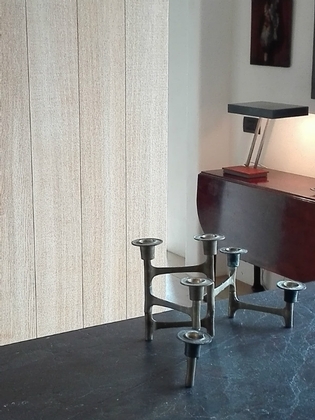 An unusual brass candlestick