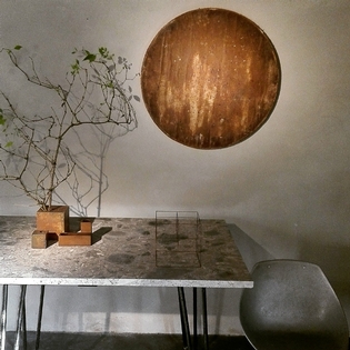 Original marble center table on black steel feet