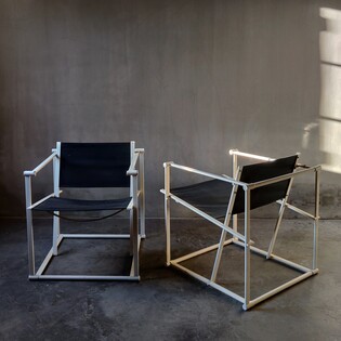 Pair of white metal and black canvas armchairs by Radboud van Beekum, 80s